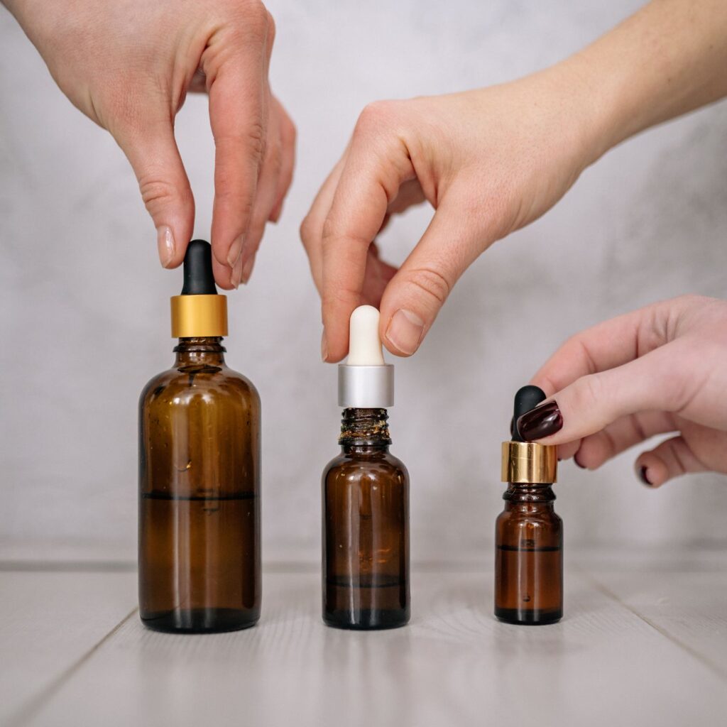 Black Spruce Essential Oil in an amber glass dropper bottle - OEM private label Malaysia