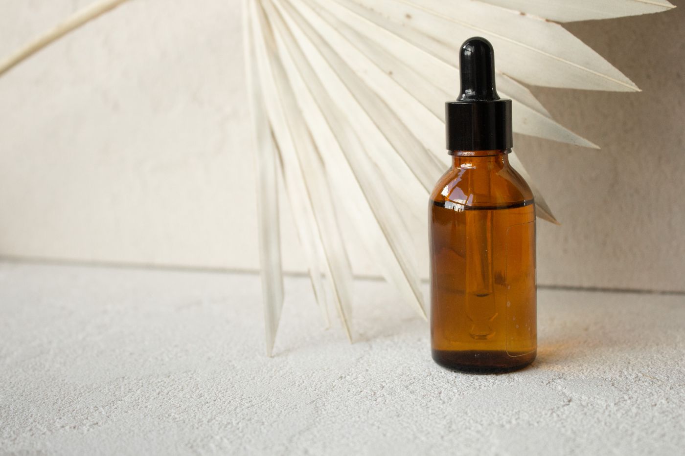 EO Natural Deodorant Stick in an amber glass dropper bottle - OEM private label Malaysia