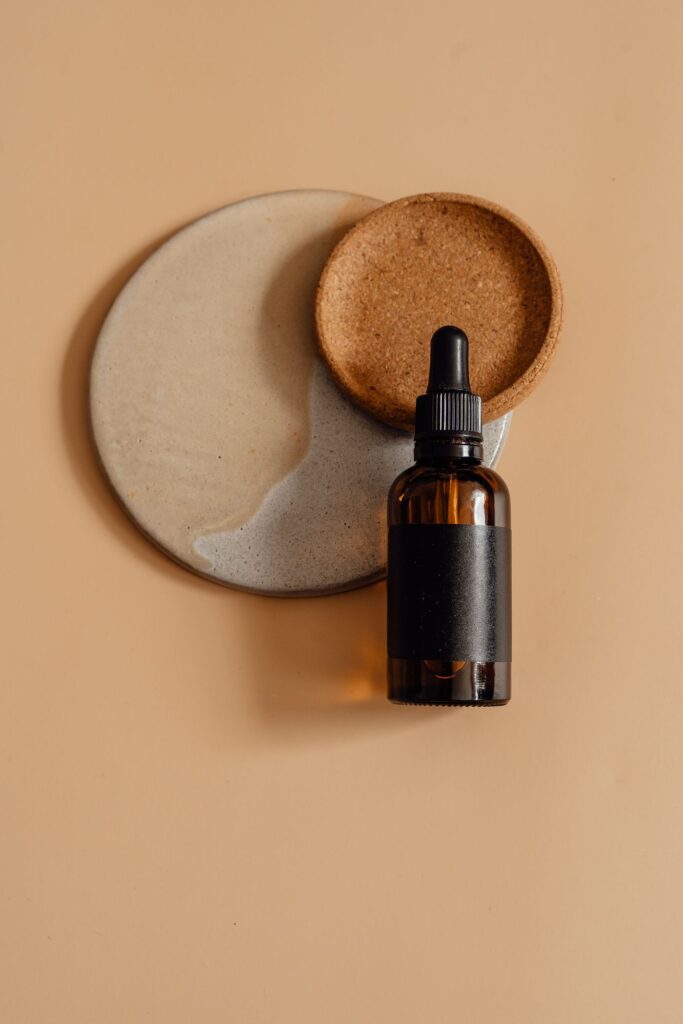 Geranium Essential Oil in an amber glass dropper bottle - OEM private label Malaysia