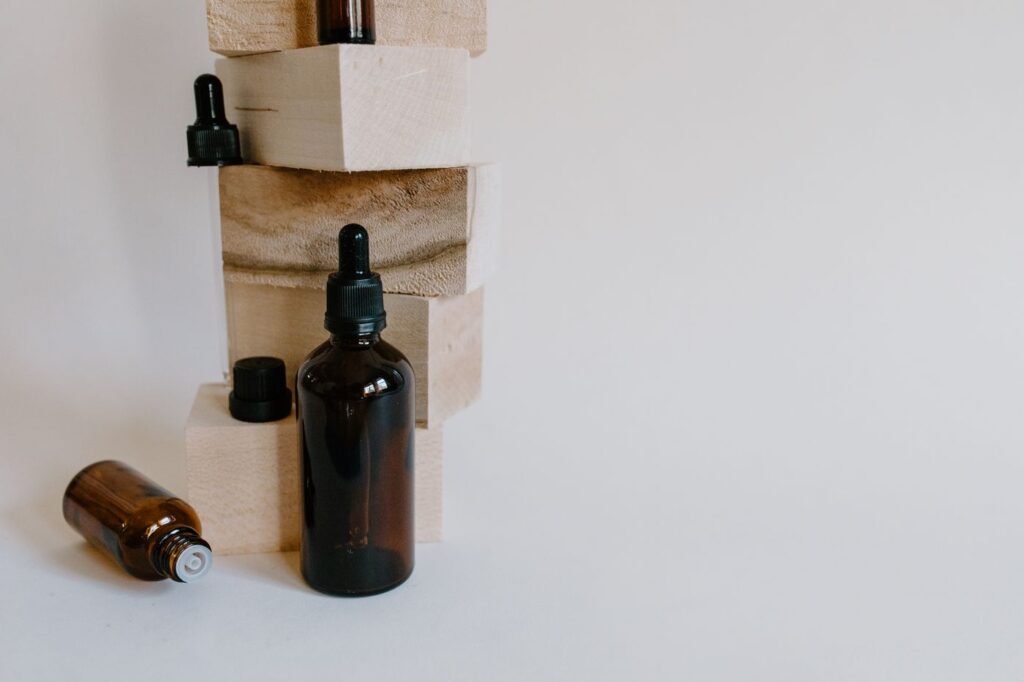 Juniper Berry Essential Oil in an amber glass dropper bottle - OEM private label Malaysia