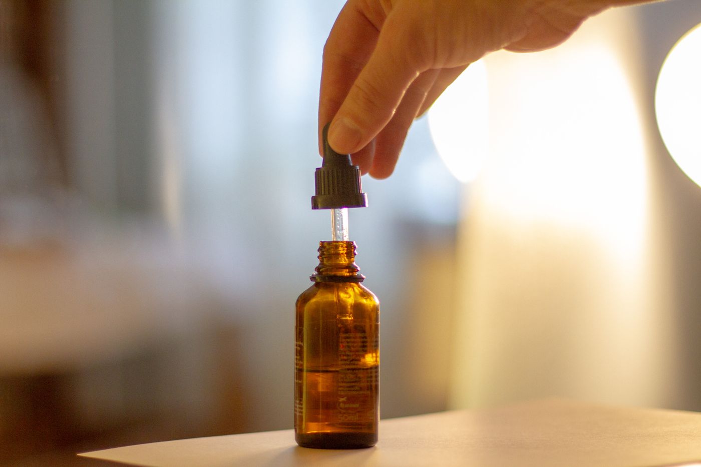 Palo Santo Essential Oil in an amber glass dropper bottle - OEM private label Malaysia