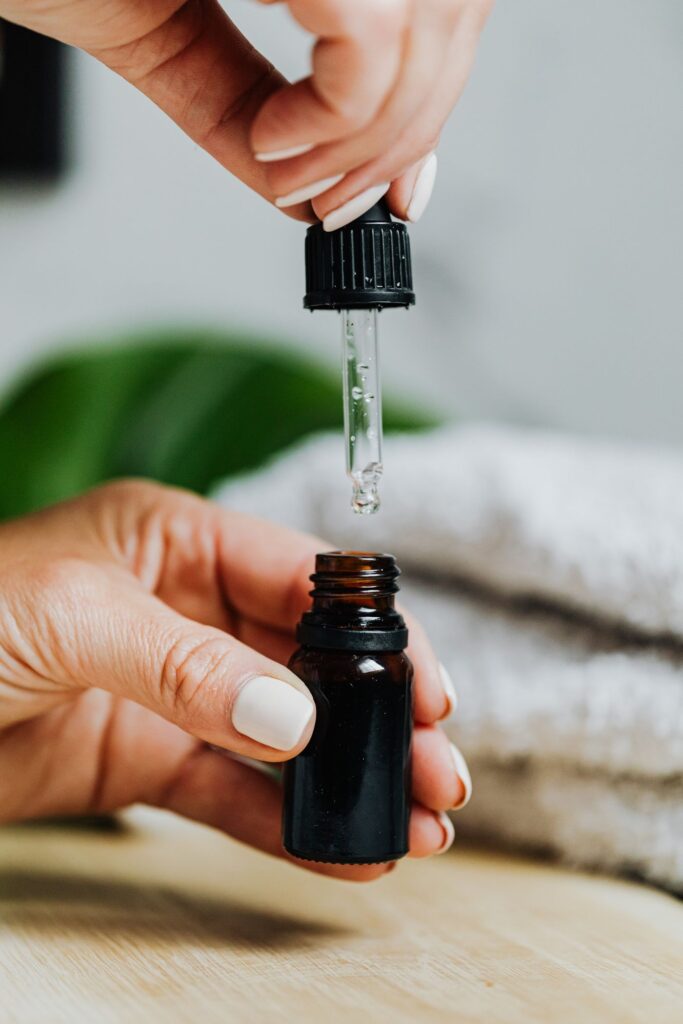 Patchouli Essential Oil in an amber glass dropper bottle - OEM private label Malaysia