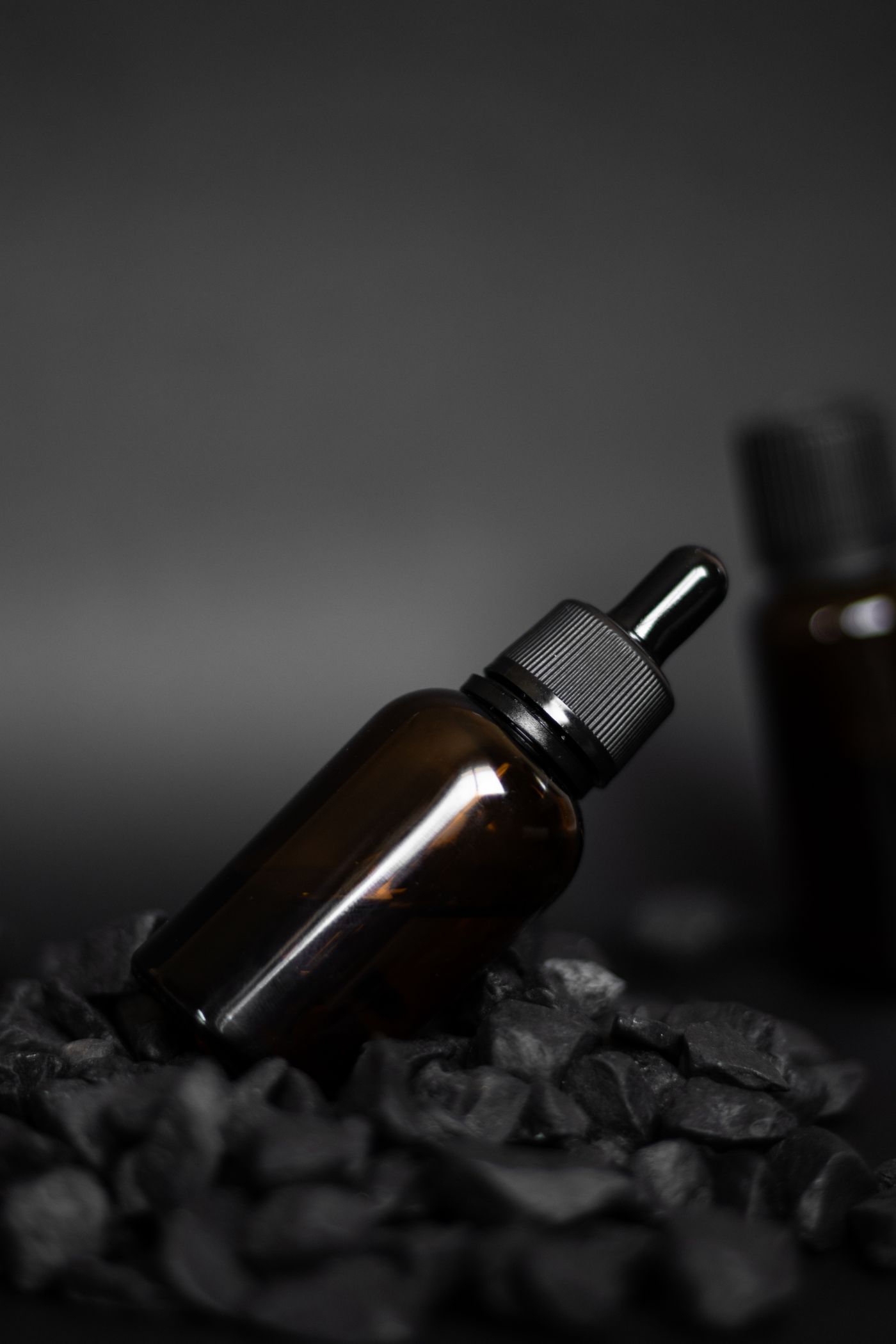 Pink Pepper Essential Oil in an amber glass dropper bottle - OEM private label Malaysia