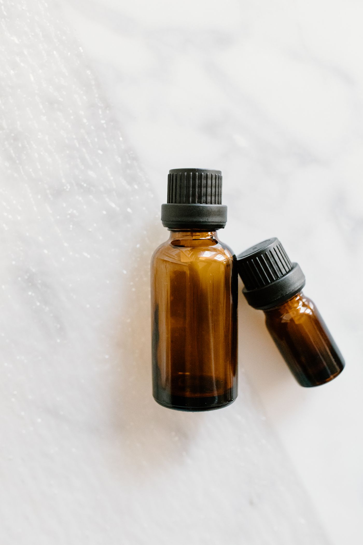 Roman Chamomile Essential Oil in an amber glass dropper bottle - OEM private label Malaysia