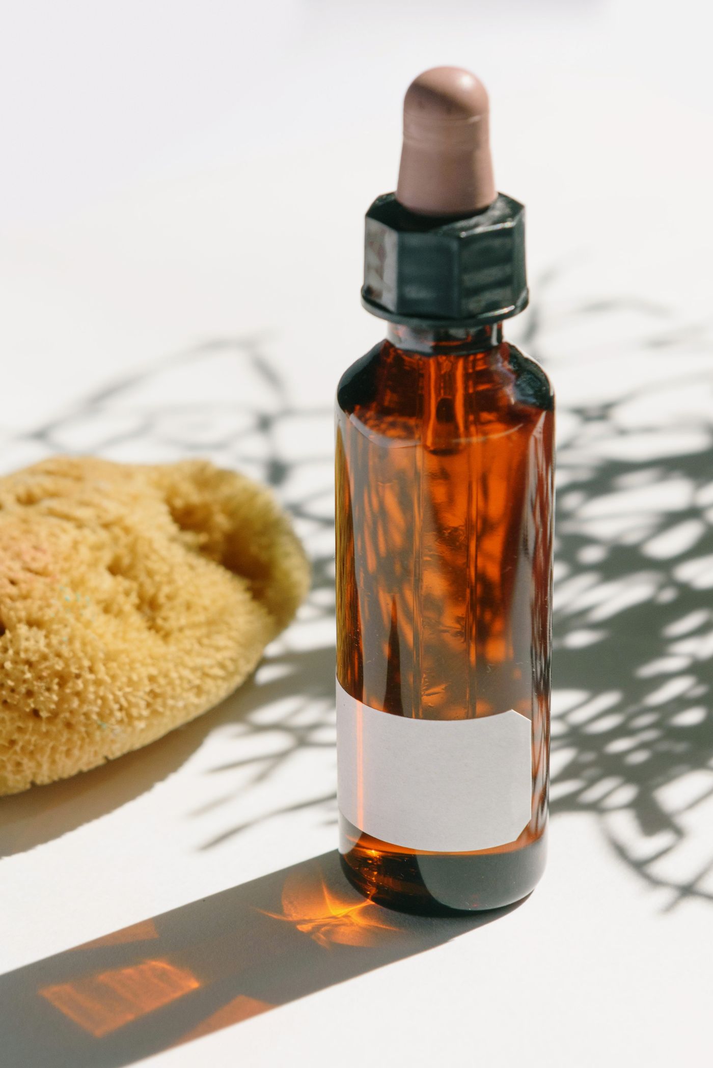 Rosemary Essential Oil in an amber glass dropper bottle - OEM private label Malaysia