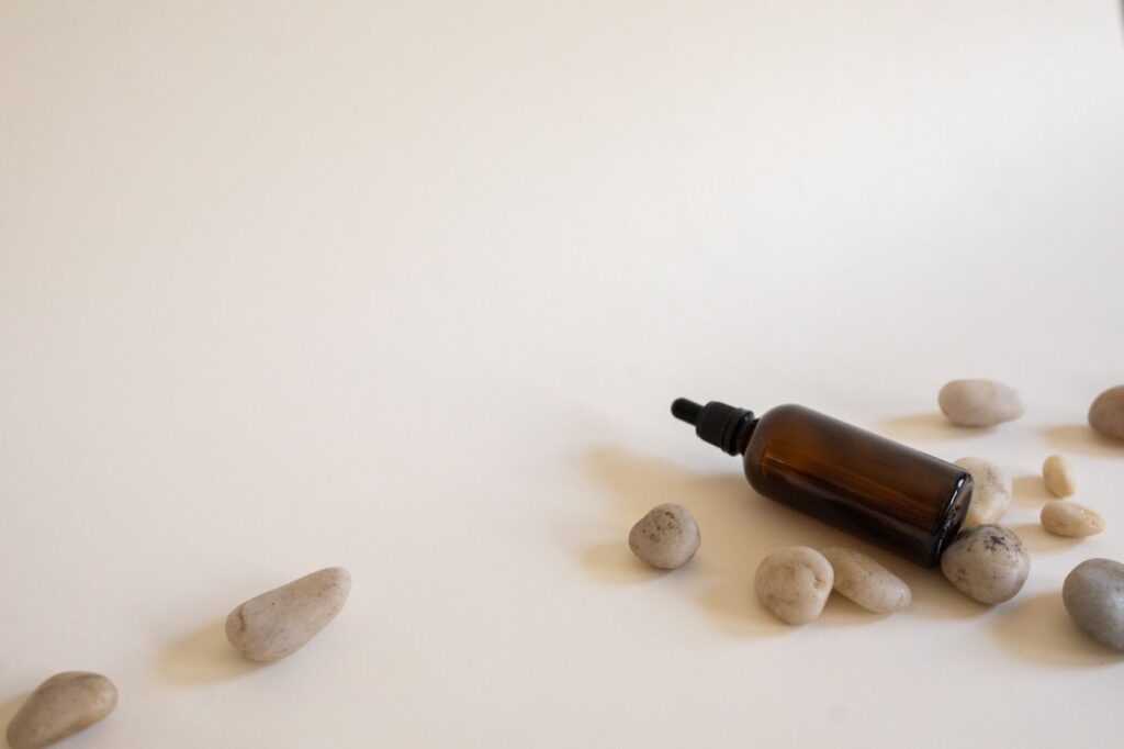 Tea Tree Essential Oil in an amber glass dropper bottle - OEM private label Malaysia