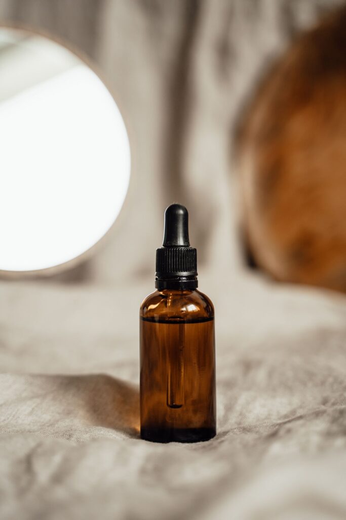 Thyme Essential Oil in an amber glass dropper bottle - OEM private label Malaysia