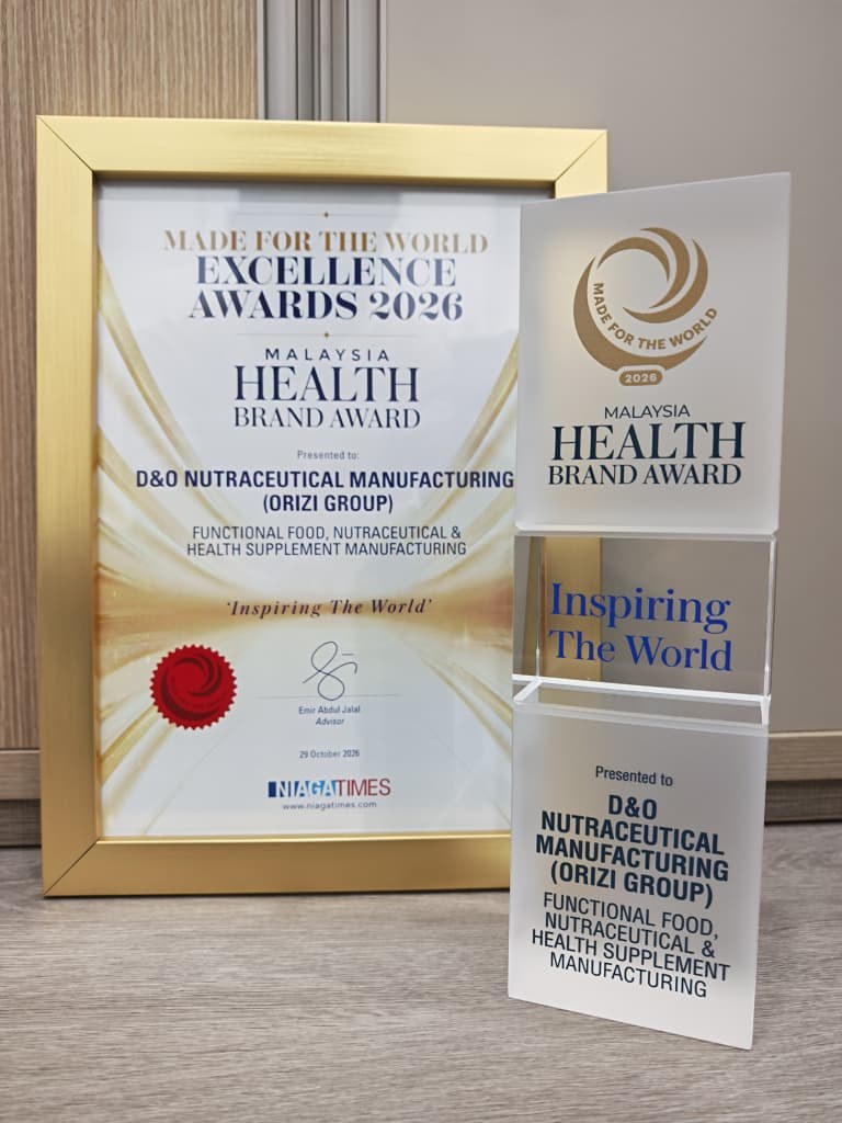 The Malaysia Health Brand Award certificate and trophy presented to D&O Nutraceutical Manufacturing (ORIZI Group), Made for the World Excellence Awards 2026