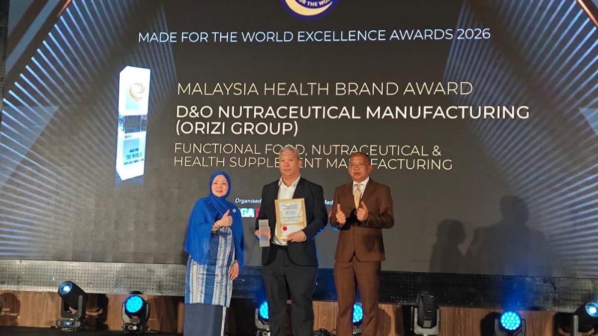 D&O Nutraceutical Manufacturing (ORIZI Group) receives the Malaysia Health Brand Award 2026 on stage at the Made for the World Excellence Awards 2026, Kuala Lumpur